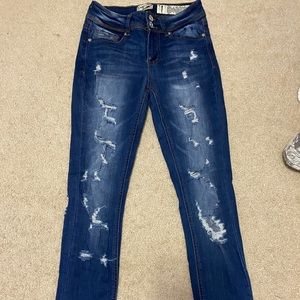 dark washed ripped jeans